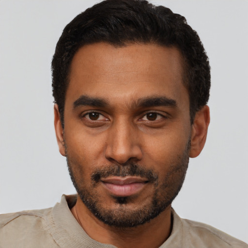 Neutral black young-adult male with short  black hair and brown eyes