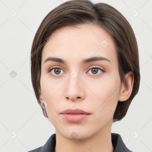 Neutral white young-adult female with medium  brown hair and brown eyes