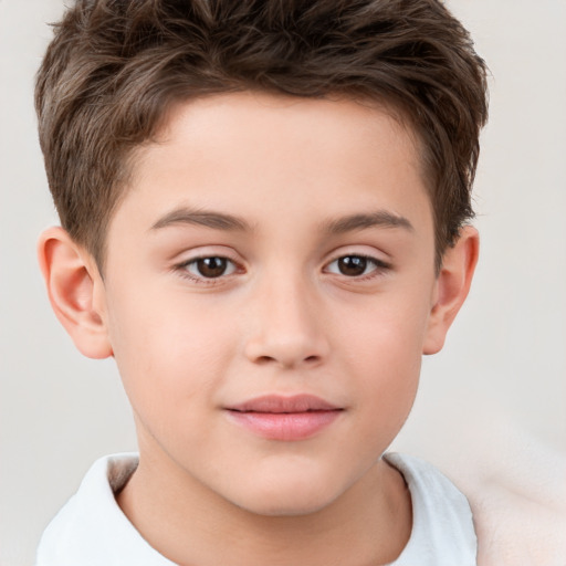 Joyful white child male with short  brown hair and brown eyes