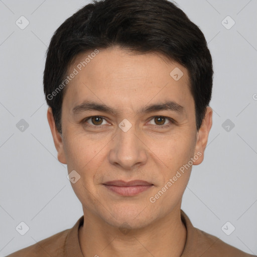 Joyful white young-adult male with short  black hair and brown eyes