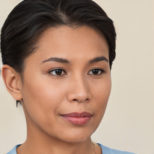 Joyful white young-adult female with short  brown hair and brown eyes