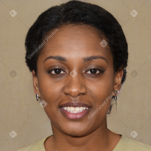 Joyful black young-adult female with short  black hair and brown eyes