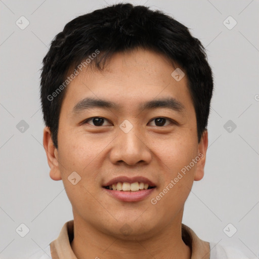 Joyful asian young-adult male with short  black hair and brown eyes