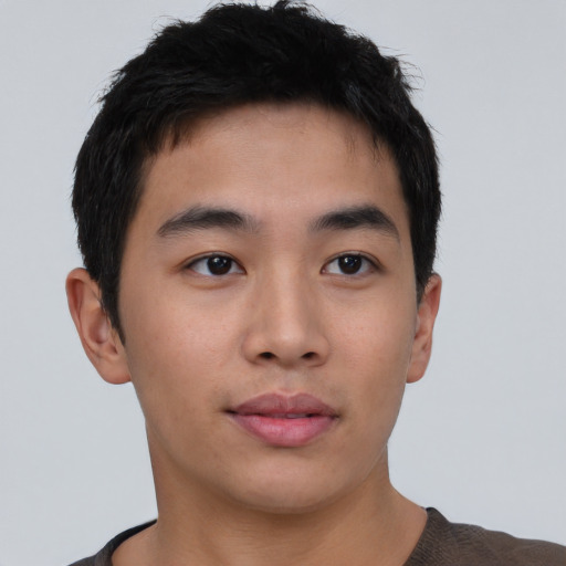 Neutral asian young-adult male with short  brown hair and brown eyes