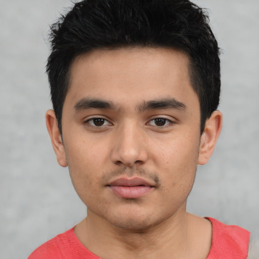 Neutral white young-adult male with short  black hair and brown eyes
