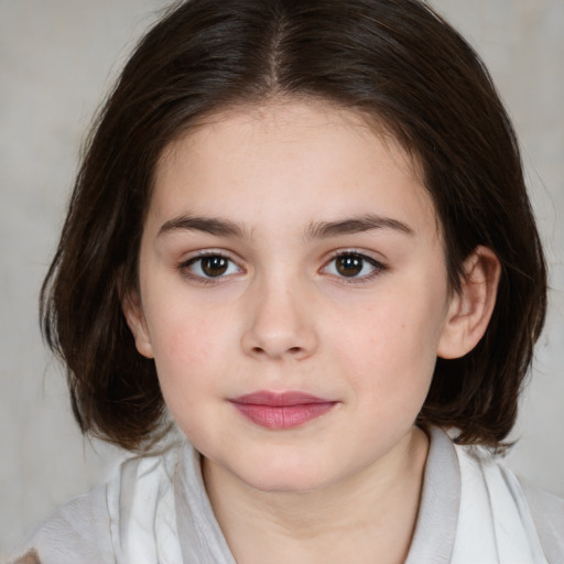 Joyful white child female with medium  brown hair and brown eyes