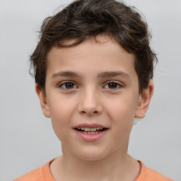 Joyful white child male with short  brown hair and brown eyes