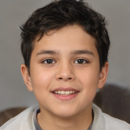 Joyful white child male with short  brown hair and brown eyes