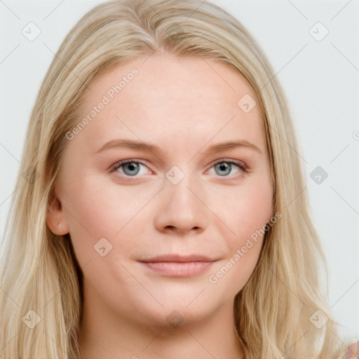 Joyful white young-adult female with long  brown hair and blue eyes