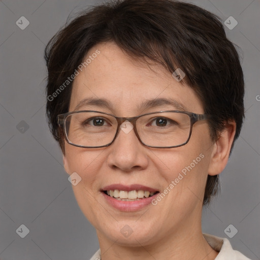 Joyful white adult female with short  brown hair and brown eyes