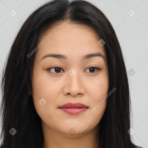 Joyful asian young-adult female with long  brown hair and brown eyes