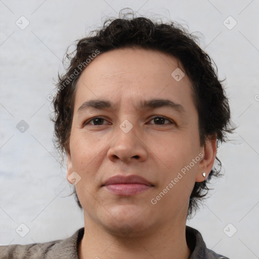 Joyful white young-adult male with medium  brown hair and brown eyes