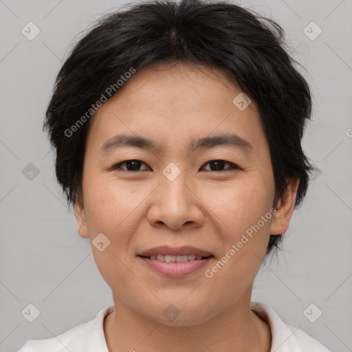 Joyful asian young-adult female with short  brown hair and brown eyes