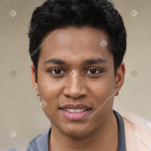 Joyful black young-adult male with short  black hair and brown eyes