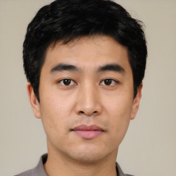 Neutral asian young-adult male with short  black hair and brown eyes