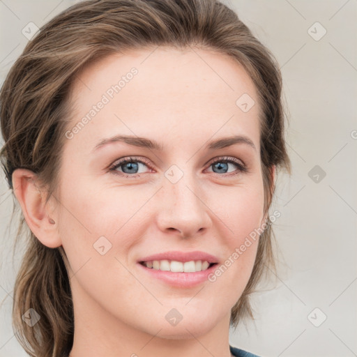 Joyful white young-adult female with medium  brown hair and blue eyes