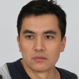 Neutral asian young-adult male with short  black hair and brown eyes