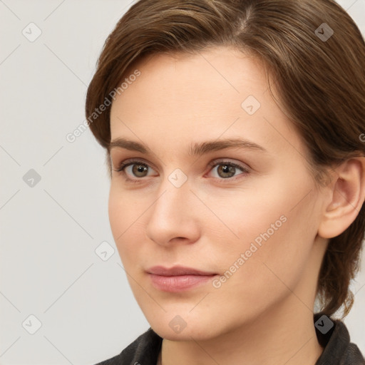 Neutral white young-adult female with short  brown hair and brown eyes