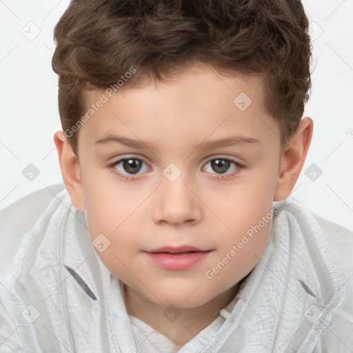 Joyful white child male with short  brown hair and brown eyes