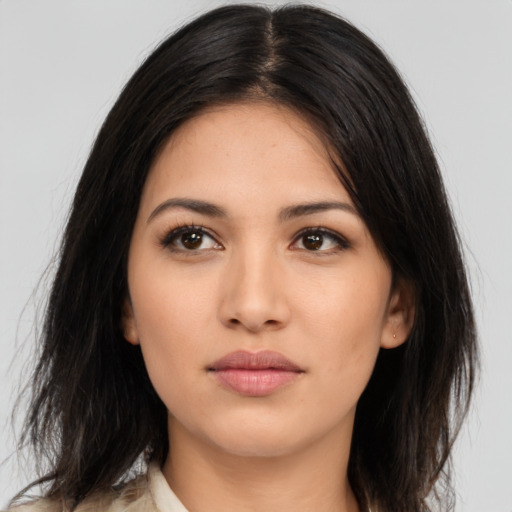 Neutral latino young-adult female with medium  brown hair and brown eyes