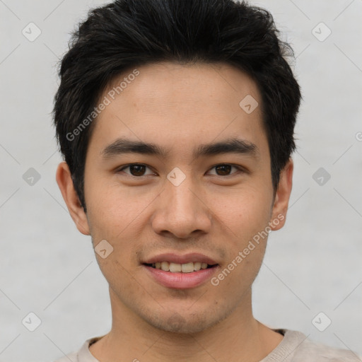 Joyful asian young-adult male with short  black hair and brown eyes