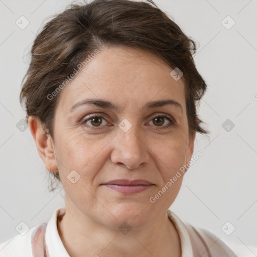 Joyful white adult female with short  brown hair and brown eyes