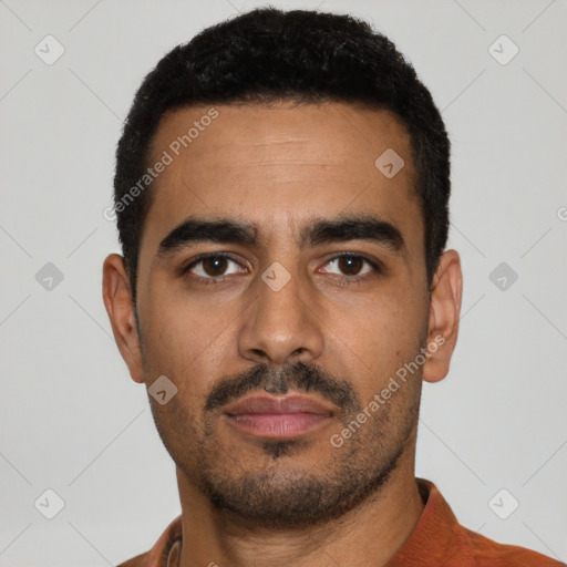 Neutral latino young-adult male with short  black hair and brown eyes
