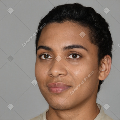 Joyful latino young-adult female with short  black hair and brown eyes