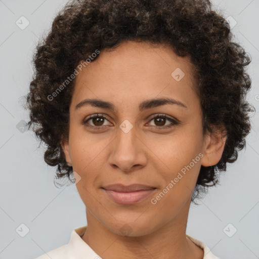 Joyful latino young-adult female with short  brown hair and brown eyes