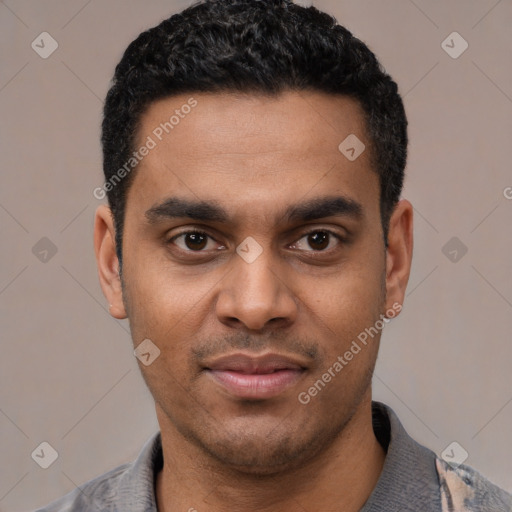 Joyful latino young-adult male with short  black hair and brown eyes