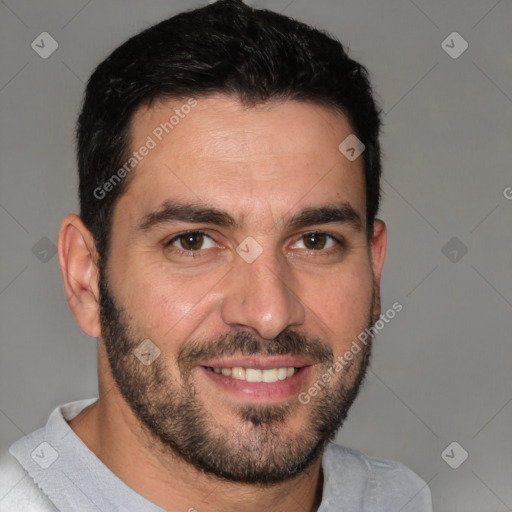 Joyful white young-adult male with short  black hair and brown eyes