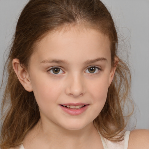 Joyful white child female with medium  brown hair and brown eyes