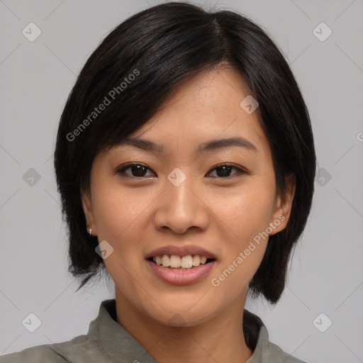 Joyful asian young-adult female with medium  black hair and brown eyes