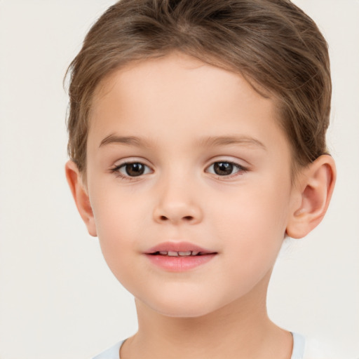 Joyful white child female with short  brown hair and brown eyes