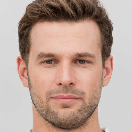Neutral white young-adult male with short  brown hair and grey eyes