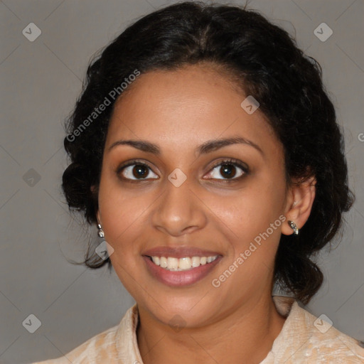 Joyful black young-adult female with medium  brown hair and brown eyes