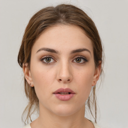 Neutral white young-adult female with medium  brown hair and brown eyes