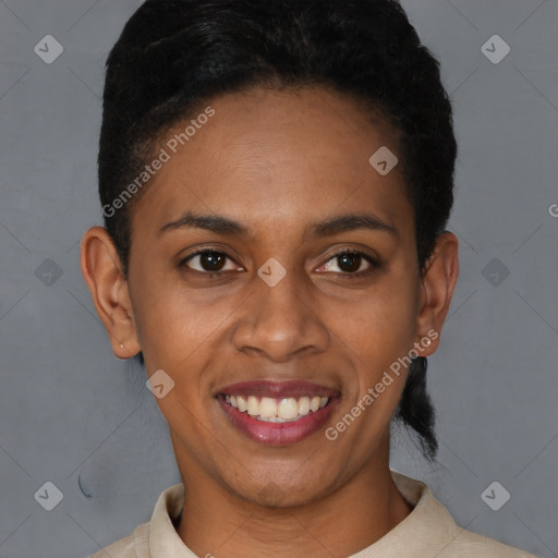 Joyful black young-adult female with short  brown hair and brown eyes