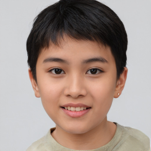 Joyful white child female with short  brown hair and brown eyes