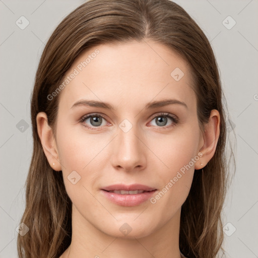 Joyful white young-adult female with long  brown hair and green eyes