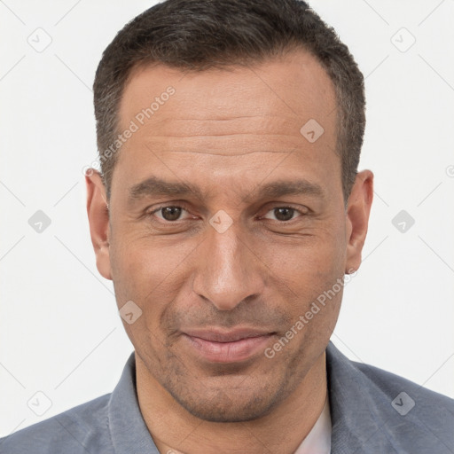 Joyful white adult male with short  brown hair and brown eyes