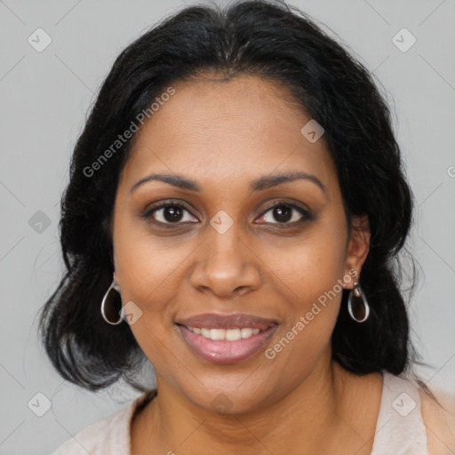 Joyful black young-adult female with medium  brown hair and brown eyes