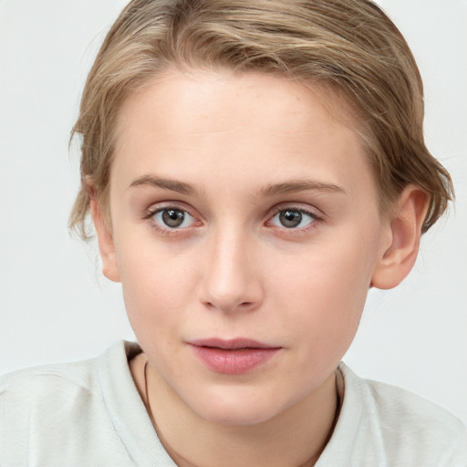 Joyful white young-adult female with medium  brown hair and blue eyes