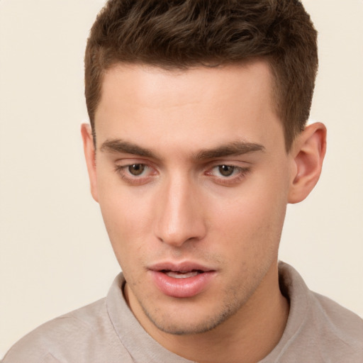 Neutral white young-adult male with short  brown hair and brown eyes