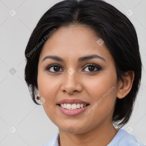 Joyful latino young-adult female with medium  brown hair and brown eyes