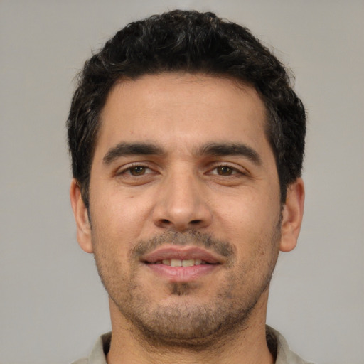 Neutral white young-adult male with short  black hair and brown eyes