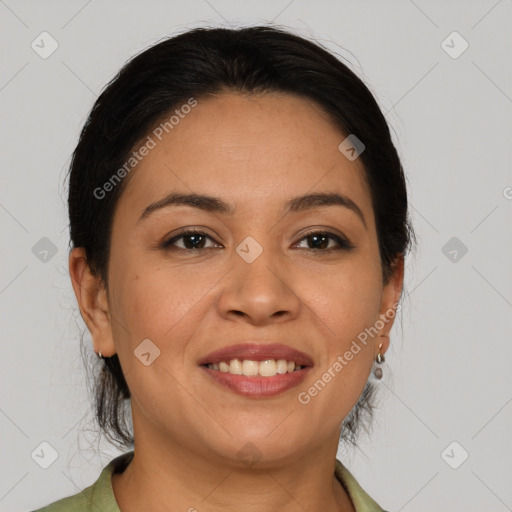 Joyful latino young-adult female with medium  brown hair and brown eyes