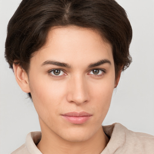 Neutral white young-adult female with short  brown hair and brown eyes