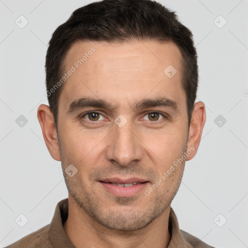 Joyful white young-adult male with short  brown hair and brown eyes