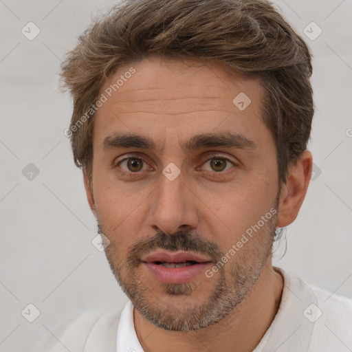 Joyful white adult male with short  brown hair and brown eyes